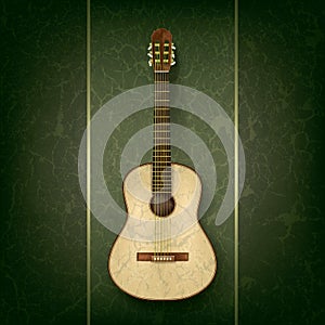 Acoustic guitar on grunge green background