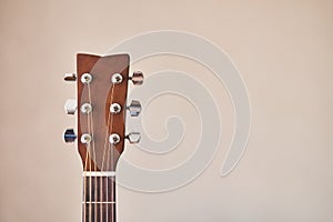 Acoustic guitar headboard with pegs. Guitar fretboard.