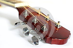 Acoustic guitar headstock on white