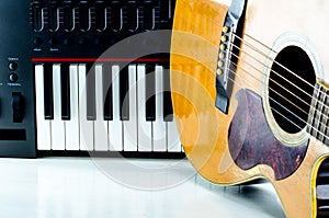 Acoustic guitar keyboard, close-up.
