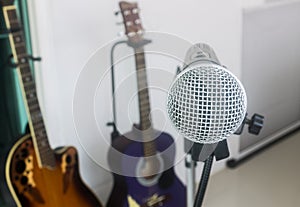 Acoustic guitar and microphone