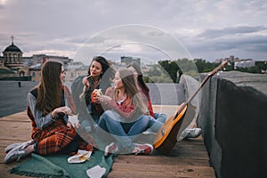 Acoustic guitar music and meeting friends on roof