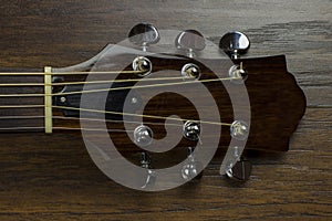 Acoustic guitar neck fingerboard frets strings music case close inlay creativity art sound vibration play music guitarist musician