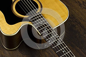 Acoustic guitar neck fingerboard frets strings music case close inlay creativity art sound vibration play music guitarist musician
