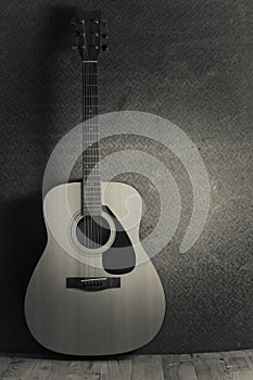 Acoustic guitar on old steel background