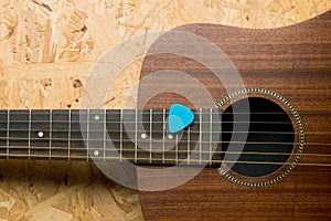 Acoustic guitar with pick