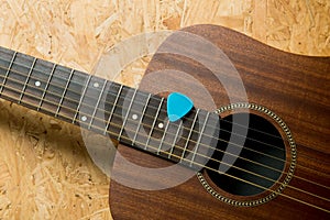 Acoustic guitar with pick
