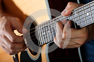 Acoustic guitar player performing song