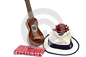 Acoustic guitar and red rose flower, isolated on white