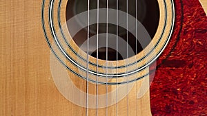 Acoustic Guitar Sound Hole and Pick