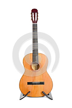 Acoustic guitar on stand