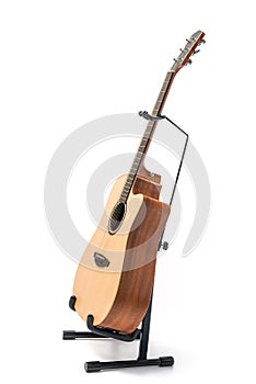 acoustic guitar with stand