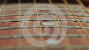 Acoustic guitar strings close up macro selective focus