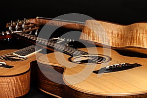 Acoustic guitars. Hand-made wooden classical and folk music inst