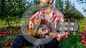 Acoustic guitars playing. Music concept. Guitars acoustic. Male musician playing guitar, music instrument. Man's