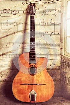 Acoustic Gypsy Jazz Guitar Vintage and Aged  with Wear and Music Notes