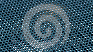 acoustic speaker with blue grille rotates in a circle