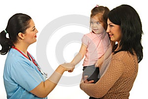 Acquaintance doctor with toddler girl photo