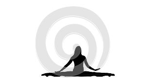 Acrobat girl sits on the twine, then sits down in the lotus pose. White background. Silhouette