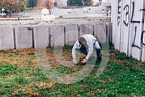 Acrobat man training parkour exercise while jumping backflip obstacles