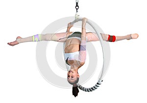 Acrobatic girl exercising on rim