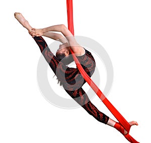 Acrobatic gymnastic girl exercising on red rope