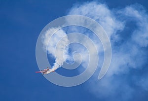 Acrobatic plane doing loops
