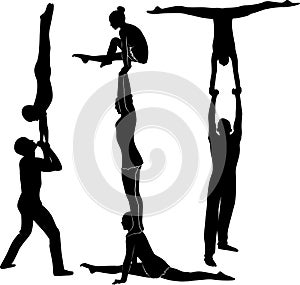 Acrobatic stunt. Gymnasts acrobats vector black silhouette. Gymnasts acrobats vector photo