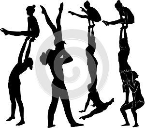 Acrobatic stunt. Gymnasts acrobats vector black silhouette.