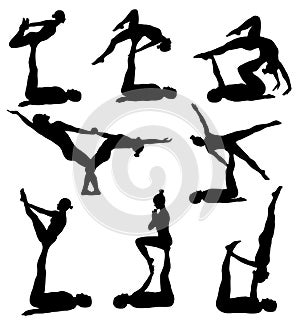 Acrobatic yoga silhouettes