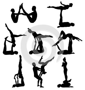 Acrobatic yoga silhouettes photo