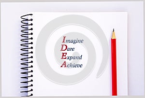 Acronym IDEA - Imagine, Dare, Expand, Achieve. Concept photo