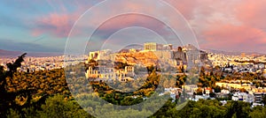 The Acropolis of Athens, Greece, with the Parthenon Temple with colorful clouds at sunset time. Athens, Greece, Europe