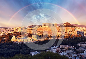 Acropolis of Athens, Greece, with the Parthenon Temple during sunset with rainbow