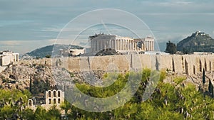 Acropolis of Athens in Greece with the Parthenon temple on the top of hill during sunrise. Popular summer vacation