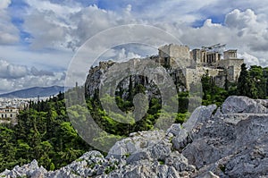 The Acropolis of Athens in panoramic view with beautifull blue cloydy sky