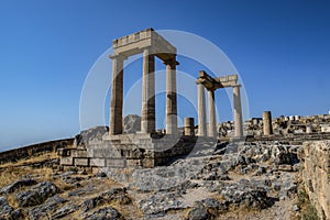 The Acropolis of Lindos in Rhodes, Greece at sunset.