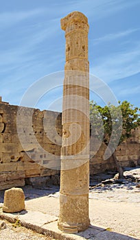 Acropolis of Lindos, the ruins of an ancient temple and the remains of the Doric columns. Lindos, Rhodes, Greece