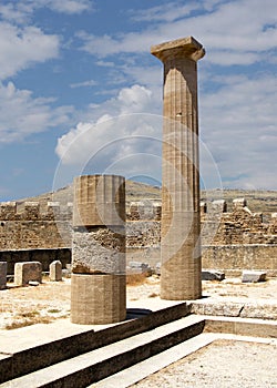 Acropolis of Lindos, the ruins of an ancient temple and the remains of the Doric columns. Lindos, Rhodes, Greece