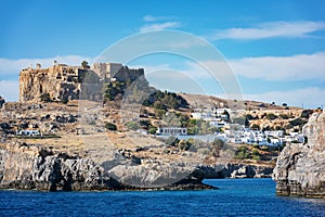 Acropolis of Lindos and village of Lindos, view from sea Rhodes