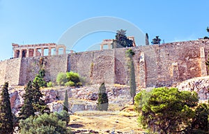 Acropolis with Parthenon behind old fortress walls, Athens, Greece