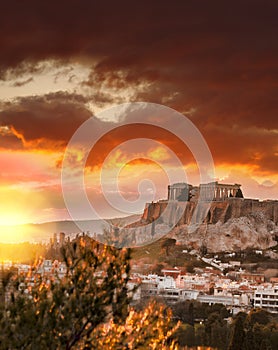 Acropolis with Parthenon temple against sunset in Athens, Greece