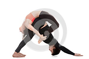 Acroyoga, downward-facing dog and bow pose