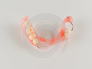 Acrylic denture with metal clasps