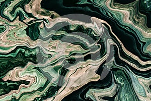 Acrylic Fluid Art. Black marble background with dark green waves. Abstract background or texture