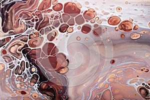 Acrylic Fluid Art. Brown bubbles and beige waves Abstract stone background or texture