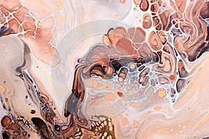 Acrylic Fluid Art. Brown bubbles, peach waves and gold inclusion. Abstract stone background or texture