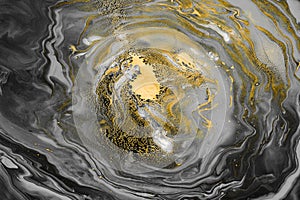 Acrylic Fluid Art. Gray black vortex waves and gold inclusions. Abstract swirling background or texture