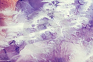 Acrylic ink water marble texture purple white rock