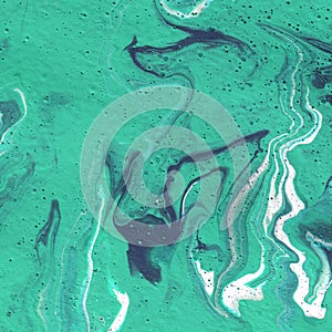 Acrylic texture made in liquid pour technique.